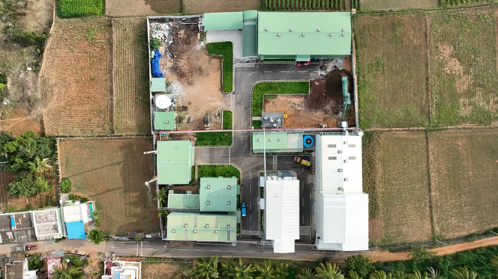 Straight-down aerial plan of the campus among fields