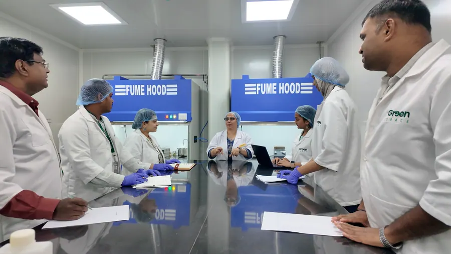 The Vignanaveda team at the bench in front of the fume hoods