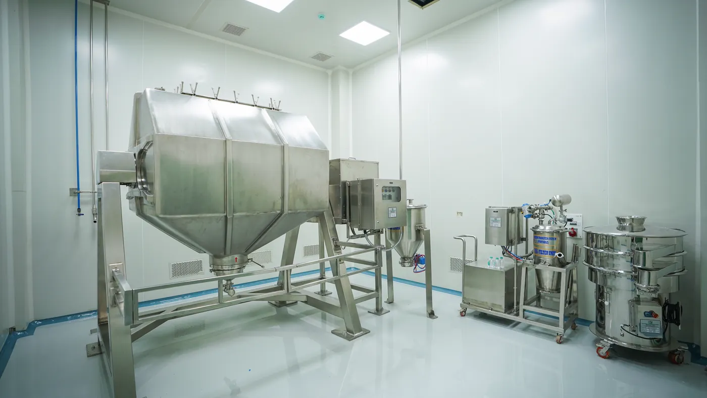 Blending and sieving equipment in a clean room at the GreenSpace Herbs facility